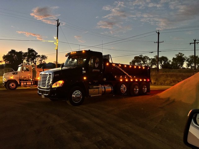 Super 10 dump truck parked at dusk
